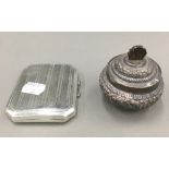 A silver cigarette case and an Eastern white metal lidded pot
