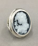 A silver cameo ring