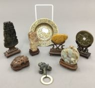 A small quantity of Chinese carved jade and other hardstone, with stands,