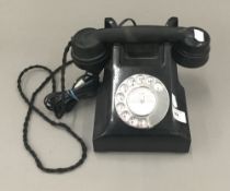 A black Bakelite telephone