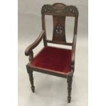 A 19th century Anglo-Indian carved Dalbergia open armchair The shaped top rail above a pierced