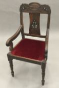 A 19th century Anglo-Indian carved Dalbergia open armchair The shaped top rail above a pierced