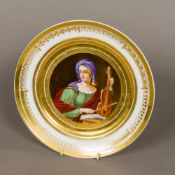 A 19th century Continental porcelain, possibly Paris, plate With floral and block built border,