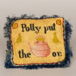A vintage Folk Art stitched/embroidered cushion bearing the phrase Polly Put the Kettle