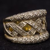 A diamond set 750 yellow and white gold ring CONDITION REPORTS: Generally good,