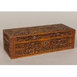 A late 19th century Canton carved wood box Of hinged rectangular form,