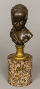 An 18th century bronze bust of a young child Stamped EDR to verso, supported on a gilt socle,