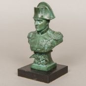 A 19th century patinated spelter bust of Napoleon Typically modelled above an eagle cast pedestal,