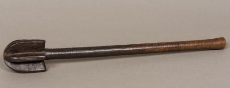 A carved wooden tribal club With five bladed knop. 45 cm long.