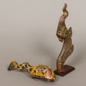 An antique Burmese polychrome and gilt decorated carved wood architectural mount Together with