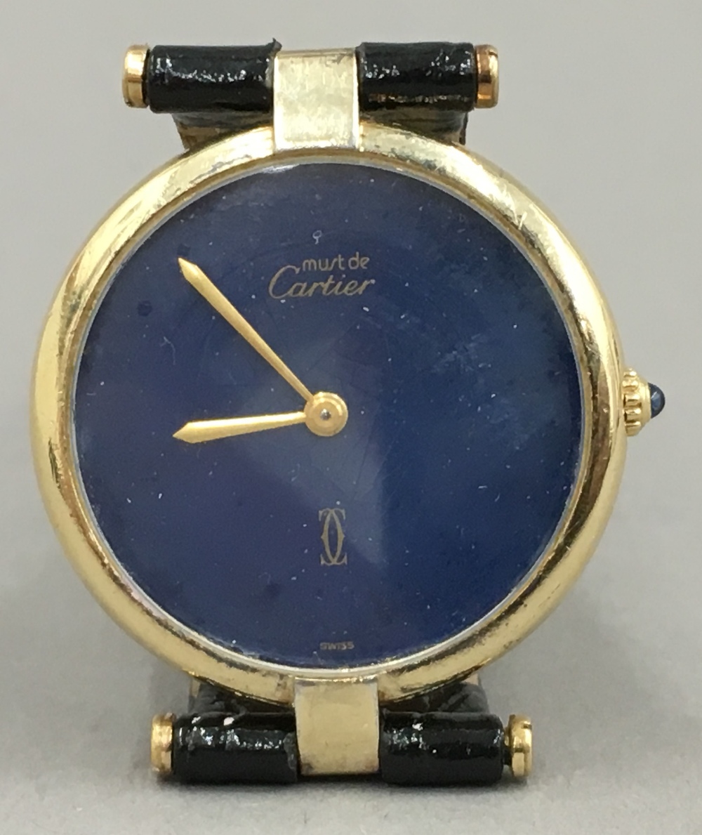 A Cartier mid-sized 18 ct gold Vermeil wristwatchThe blue dial ...