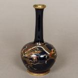 A late 19th/early 20th century Chinese cloisonne vase Of ovoid form, with elongated neck,