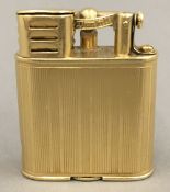 A Dunhill 18 ct gold plated lighter, signed Alfred Dunhill, Paris and patent number 143752 5.