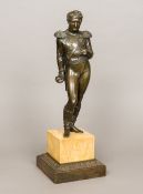 A 19th century patinated bronze model of Napoleon Modelled standing in naval uniform holding a