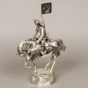 A silver model of a samurai warrior on horseback,