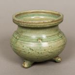 A Chinese porcelain footed planter With incised decoration on a celadon ground. 12 cm high.