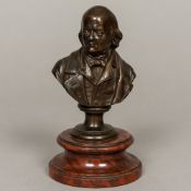 A 19th century bronze bust of a nobleman Standing on a rouge marble socle base. 18 cm high.