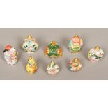 Eight Chinese porcelain snuff bottles and stoppers Various moulded/decorated.