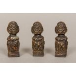 Three Tibetan bronze seals Each worked with mythical beasts, each with cast matrix. Each 7 cm high.
