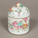 A Chinese famille rose porcelain box and cover Of circular section,