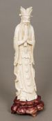 A late 19th/early 20th century Chinese carved ivory figure Worked as a bearded sage,