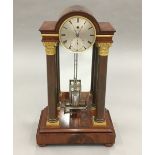 An early 19th century ormolu mounted mahogany cased regulator table clock,