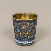 A 19th century Russian enamel decorated silver tot cup Decorated in the round with scrolling