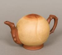 An unusual Chinese Yixing pottery teapot Of solid domed form with loop handle and spout,