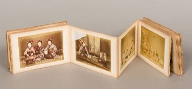 A late 19th/early 20th century Japanese concertina album Enclosing coloured photographic prints of