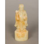 A Chinese carved hardstone, possibly white jade,