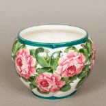 A Wemyss pottery jardiniere Of spiralling reeded form, decorated in the Cabbage Roses pattern,