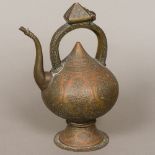 An antique brass and copper Safavid ewer The loop handle incorporating the hinged lid,