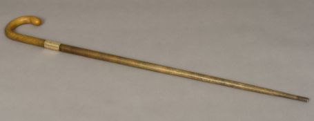 A substantial late 19th/early 20th century rhino horn walking stick Of typical form,