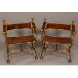 A pair of Continental 20th century metal framed leather X-framed chairs 65 cm wide.