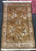 A silk Ghom pictorial rug,