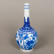 A Chinese blue and white porcelain vase The elongated neck above the bulbous body decorated with