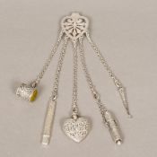 A Victorian silver chatelaine, the clasp hallmarked London 1894, maker's mark of CS FS,