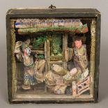 A 19th century Chinese cased figural diorama Formed as a theatrical group. 24 cm high.