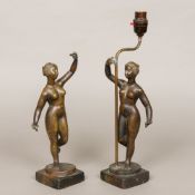 A pair of bronze cast female figures Modelled dancing and previously mounted as lamp bases.