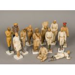 Thirteen 19th century East India Company School type clay figures Each of typical form,