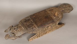 A 19th century tribal carved wooden canoe seat, probably Sawos People of the Sepik Coast,