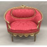 A 19th century French giltwood framed upholstered settee Of small proportions,