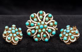 A suite of unmarked gold turquoise and enamel jewellery Comprising: a brooch and a pair of clip