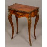 A 19th century Continental gilt metal mounted marquetry inlaid kingwood side table With serpentine
