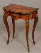 A 19th century Continental gilt metal mounted marquetry inlaid kingwood side table With serpentine
