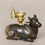 A 19th century Anglo-Indian finely carved horn (possibly rhino) model of an ox The back with brass