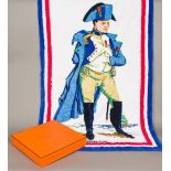 A Hermes cotton towel Worked with the figure of Napoleon within a tricolour border, signed Hermes,