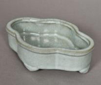 A Chinese Ming porcelain celadon glazed brush washer Of quatrefoil form with allover crackle glaze,