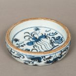A Chinese blue and white porcelain dish Of circular form, decorated with water birds and foliage.