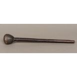 A 19th century carved wooden tribal club,